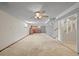 Basement with carpet flooring, brick wet bar, and stairway to upper level at 5703 Field St, Arvada, CO 80002