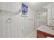 Quaint bathroom featuring a shower and single sink vanity, offering essential functionality at 5703 Field St, Arvada, CO 80002