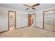 Spacious main bedroom with multiple entryways and closet space at 5703 Field St, Arvada, CO 80002