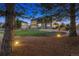 Landscaped backyard with lush greenery and exterior views of the home at 1302 Milbury St, Castle Rock, CO 80104