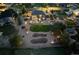 Aerial view of an expansive backyard featuring a patio, lush lawn, and meticulously designed landscaping at 1302 Milbury St, Castle Rock, CO 80104
