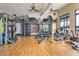 On-site gym with modern equipment, including treadmills, weights, and workout space at 30 Sun Up Ct, Erie, CO 80516