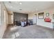Cozy loft area with plush carpeting, perfect for relaxing or entertaining at 30 Sun Up Ct, Erie, CO 80516