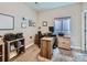 Home office featuring a work desk with a printer and shelving for storage and decorations at 30 Sun Up Ct, Erie, CO 80516