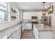 Modern kitchen with granite countertops, stainless steel appliances, and a convenient island at 4260 E Warren Ave # 5, Denver, CO 80222