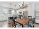 Modern kitchen with stainless steel appliances, granite countertops, and an island with seating at 4260 E Warren Ave # 5, Denver, CO 80222