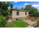 Charming brick home with a well-maintained yard and privacy fence at 1540 Filbert Ct, Denver, CO 80220