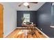 Bedroom featuring hardwood floors, a ceiling fan and bright windows at 1540 Filbert Ct, Denver, CO 80220