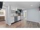 Modern kitchen with butcher block counters, stainless appliances and wood floors at 1540 Filbert Ct, Denver, CO 80220