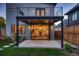 Modern home's interior is partially visible through open sliding doors leading to a patio at 291 S Franklin St, Denver, CO 80209