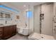 Spa-like bathroom with soaking tub and walk-in shower at 291 S Franklin St, Denver, CO 80209