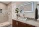 Elegant bathroom with a walk-in shower and modern vanity at 291 S Franklin St, Denver, CO 80209