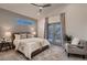 Spacious bedroom with king-size bed and access to private deck at 291 S Franklin St, Denver, CO 80209