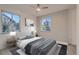 Comfortable bedroom with a queen-size bed and ample natural light at 291 S Franklin St, Denver, CO 80209