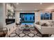 Bright living room with a fireplace and sliding glass doors leading to the backyard at 291 S Franklin St, Denver, CO 80209