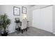 Bedroom featuring carpet, modern art, and sliding door closet at 4633 S Crystal Way # E189, Aurora, CO 80015