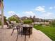Outdoor living space with fire pit, seating area, and landscaped yard at 2351 Lassen Ln, Castle Rock, CO 80109