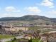 View of the community featuring local businesses and the landscape at 2351 Lassen Ln, Castle Rock, CO 80109
