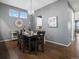 Formal dining room with an elegant chandelier, large table, and sophisticated decor at 2351 Lassen Ln, Castle Rock, CO 80109