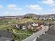 Charming two-story home featuring a balcony with views of the neighborhood and mountain backdrop at 2351 Lassen Ln, Castle Rock, CO 80109