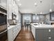 Well-designed kitchen with sleek countertops, stainless steel appliances, and an adjacent dining area at 2351 Lassen Ln, Castle Rock, CO 80109