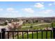 View of neighborhood houses and rolling hills from a backyard at 2351 Lassen Ln, Castle Rock, CO 80109