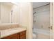 Bathroom featuring granite countertops and a shower and bathtub combo at 5770 E Warren Ave # 206, Denver, CO 80222