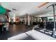 Well-equipped gym with cardio and weight machines at 2 Adams St # 905, Denver, CO 80206