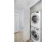 Convenient laundry area with stacked washer and dryer units at 2 Adams St # 905, Denver, CO 80206