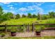 Picturesque backyard offering serene views, a wooden fence, and colorful flower pots at 2061 Chesapeake Pl, Highlands Ranch, CO 80126