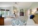 Serene primary bedroom with seating area and views of the yard at 2061 Chesapeake Pl, Highlands Ranch, CO 80126