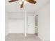 Cozy bedroom with a closet for easy storage and door leading to another room at 9685 W Chatfield Ave # A, Littleton, CO 80128