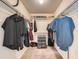 Walk-in closet with ample storage space and shelving for organization at 2146 S Scranton Way, Aurora, CO 80014