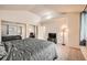 Spacious bedroom with a large closet and a cozy atmosphere with carpeted floors at 2146 S Scranton Way, Aurora, CO 80014