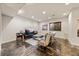 Cozy living area with comfortable seating, stylish decor, and modern entertainment setup for relaxation at 1730 W 67Th Ave, Denver, CO 80221