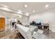 Spacious living area with sleek concrete floors, stylish decor, and open layout perfect for modern living at 1730 W 67Th Ave, Denver, CO 80221