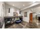 Recreational area with modern decor and fun elements such as a mini trampoline, creating a playful atmosphere at 1730 W 67Th Ave, Denver, CO 80221