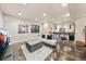 Open living space with sleek furnishings and recessed lighting, perfect for entertaining and relaxation at 1730 W 67Th Ave, Denver, CO 80221