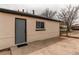 Enclosed backyard with access door to the home at 9280 Russell Way, Thornton, CO 80229