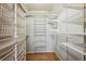 Large walk-in closet with ample shelving and storage at 6324 S Grape Ct, Centennial, CO 80121