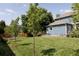 Well-manicured lawn and landscaping enhance the appeal of this home's spacious and inviting backyard at 8501 W Union Ave # 41, Littleton, CO 80123