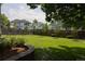 This fenced yard offers a serene outdoor space with verdant lawn and tasteful landscaping for peaceful enjoyment at 8501 W Union Ave # 41, Littleton, CO 80123