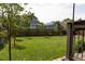 A vast lawn is the centerpiece of this back yard, providing ample space for recreation and outdoor enjoyment at 8501 W Union Ave # 41, Littleton, CO 80123