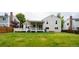 Lush backyard featuring a covered deck area, perfect for outdoor living and entertaining at 4760 S Wright Way, Morrison, CO 80465