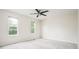 Spacious bedroom with neutral carpet and bright windows at 4760 S Wright Way, Morrison, CO 80465