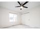 Neutral bedroom with a ceiling fan and closet at 4760 S Wright Way, Morrison, CO 80465