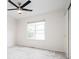 Cozy bedroom with a ceiling fan, neutral carpet and paint, and a window that provides natural light at 4760 S Wright Way, Morrison, CO 80465
