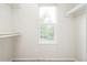 Bright closet with adjustable shelving and a view to the outside at 4760 S Wright Way, Morrison, CO 80465