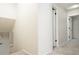 Upstairs hallway showing the staircase and access to bedrooms and bathrooms at 4760 S Wright Way, Morrison, CO 80465
