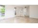 Bright and airy living room featuring wood flooring, modern lighting and access to the entryway at 4760 S Wright Way, Morrison, CO 80465